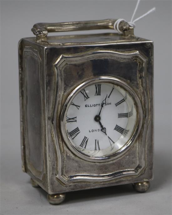 A sterling silver carriage timepiece, retailed by Elliott & Son, London, 77mm.